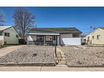 Charming single-story home with a rockscaped front yard and inviting covered porch at 433 S Xavier St, Denver, CO 80219