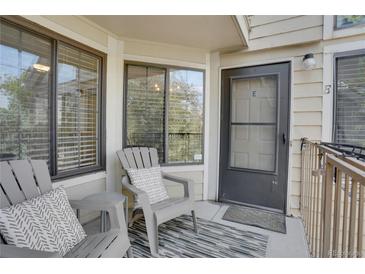 Inviting patio with comfortable seating, perfect for enjoying the outdoors at 4802 E Kentucky Ave # E, Denver, CO 80246
