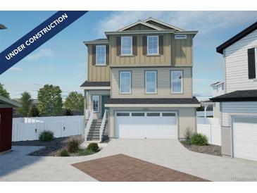 Charming two-story home featuring a two-car garage and landscaped front yard under construction at 22033 E 38Th Pl, Aurora, CO 80019