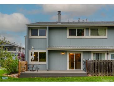 Charming two-story home with backyard patio, and sliding glass doors, perfect for outdoor living and entertaining at 4140 Monroe Dr # C, Boulder, CO 80303