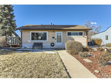 Charming single-story home with a well-maintained front yard and walkway leading to the front door at 841 N Oakland St, Aurora, CO 80010