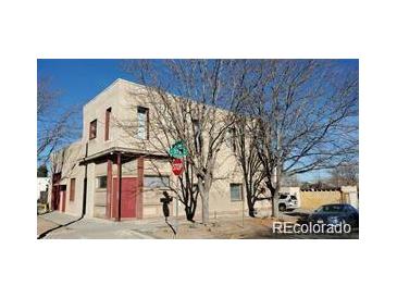 Two-story home featuring a flat roof, stucco siding, with street and neighborhood views at 3700-3704 Osage St, Denver, CO 80211