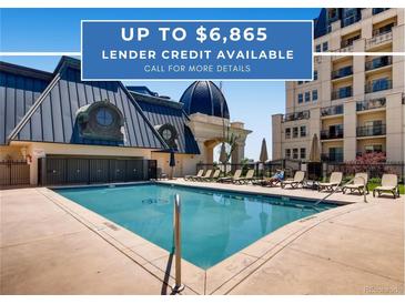 Inviting pool area with ample seating and well-maintained landscaping at this luxurious community at 925 N Lincoln St # 8E-S, Denver, CO 80203