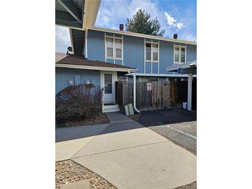 Charming two-story condo featuring a private entrance and convenient carport parking at 264 S Newark Cir, Aurora, CO 80012