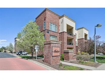 Well maintained Avalon Inverness complex with manicured landscaping and brick facade at 307 Inverness S Way # 307, Englewood, CO 80112