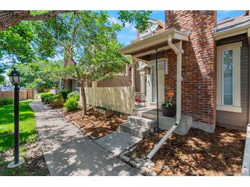 Charming front porch with brick facade and welcoming entrance at 2092 S Helena St # C, Aurora, CO 80013