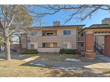 Exterior view of a two-story condo building with landscaping at 770 Copper Ln # 206, Louisville, CO 80027