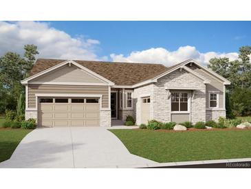 Charming single-story home with a two-car garage, stone accents, and a well-maintained lawn at 24791 E 38Th Ave, Aurora, CO 80019