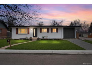 Charming single-story home featuring a well-manicured lawn and an attached one-car garage at 6511 S Cedar St, Littleton, CO 80120