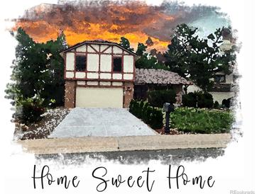 Charming exterior featuring a two-story home with a well-maintained lawn and inviting curb appeal at 5138 S Sedalia Ct, Centennial, CO 80015