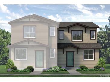 Charming two-story home with a welcoming front porch and professionally landscaped front yard at 1450 Coral Pl, Longmont, CO 80504