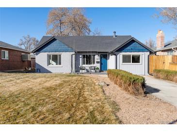 Charming single-story home with a well-maintained front yard and walkway at 2675 Kearney St, Denver, CO 80207