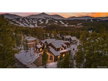 Luxury home with mountain views in snowy setting at 127 Windwood Cir, Breckenridge, CO 80424