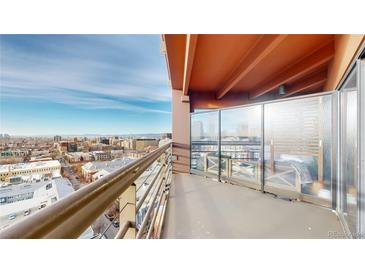 Enjoy the city views from this condo's private balcony with railing and partial glass enclosure at 100 Park W Ave # 1806, Denver, CO 80205