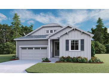 Charming one-story home with gray siding, manicured lawn, and attached two-car garage at 1352 Lumber Ridge N Cir, Erie, CO 80516