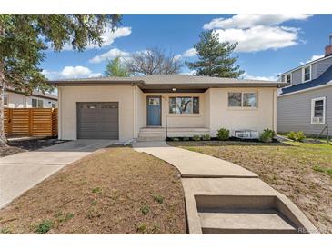 Charming single-story brick home with a well-maintained lawn, a walkway, and a one car garage at 4916 Knox Ct, Denver, CO 80221