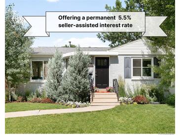 Charming exterior with well-maintained lawn and front yard landscaping at 3055 S Bannock St, Englewood, CO 80110