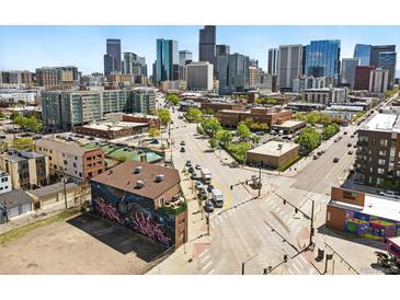 Panoramic aerial view of downtown Denver showcasing the city skyline and vibrant streetscape below at 2400 N Broadway # 4, Denver, CO 80205