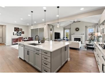 Open floorplan boasts an eat in kitchen, living room and dining area perfect for entertaining and cooking at 3131 Keepsake Way, Castle Rock, CO 80109