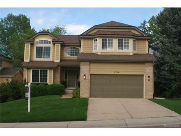 Charming two-story home with well-maintained landscaping at 7114 Mountain Brush Cir, Highlands Ranch, CO 80130