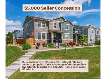 Charming two-story home with landscaped front yard and inviting curb appeal in a desirable neighborhood at 11330 Pacific Peak Ct, Parker, CO 80134