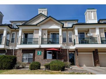 Charming condo exterior with brick accents, balcony, and private entrance, perfect for convenient living at 1881 Mallard Dr # 1881, Superior, CO 80027
