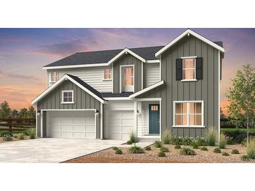 Charming two-story home with a three-car garage and beautiful landscaping at 3994 Breakcamp Ct, Castle Rock, CO 80108