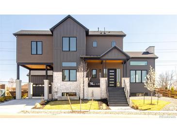 Stunning modern exterior showcases unique architectural details and professional landscaping at 8230 W Tennessee Ct, Lakewood, CO 80226