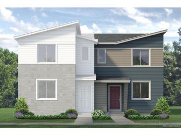 Striking two-story modern home with eye-catching split color scheme and low maintenance front yard at 1458 Coral Pl, Longmont, CO 80504