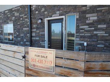 Charming exterior of the home featuring stone accents and a 
