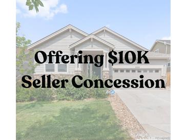Charming single-Gathering home with manicured lawn and inviting entrance, complemented by a two-car garage at 6484 S Harvest St, Aurora, CO 80016