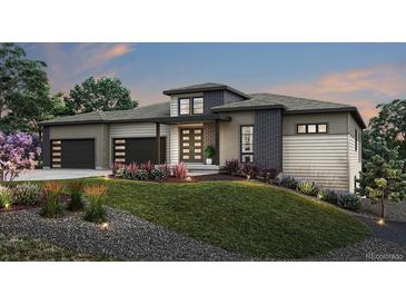Stunning contemporary home with a two-car garage and well-maintained front yard at 5208 Soledad Cir, Parker, CO 80134
