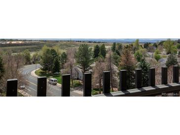 Enjoy this neighborhood view from the private balcony space at 14390 E Marina Dr # 601, Aurora, CO 80014