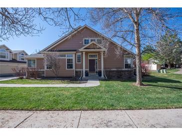 Charming single-Gathering home with a well-manicured lawn and inviting front entrance at 8403 S Miller Ct, Littleton, CO 80127