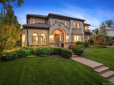 Stunning two-story home with a beautifully landscaped lawn at 21 S Kearney St, Denver, CO 80224