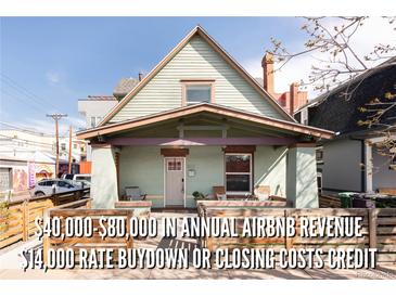 Charming single-Gathering home with a covered porch and a well-maintained exterior, perfect for comfortable living at 809 W 9Th Ave, Denver, CO 80204