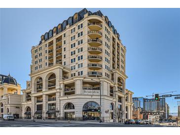 Stunning multi-story building with brick facade, balconies, and unique architectural details at 975 N Lincoln St # 4I, Denver, CO 80203