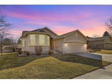 Inviting single-Gathering home with a two-car garage and well-maintained lawn, perfect for suburban living at 10340 Winona Ct, Westminster, CO 80031