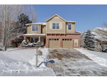 Two-story house with a brick facade and attached two-car garage at 3925 Broadview Pl, Castle Rock, CO 80109