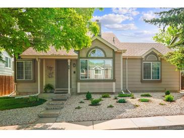 Charming single-story home with stone landscaping and a well-maintained front yard at 98 N Quicksilver Ave, Castle Rock, CO 80104