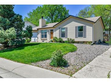 Charming single-Gathering home with manicured lawn and inviting curb appeal in a quiet neighborhood at 1759 Cedar St, Broomfield, CO 80020