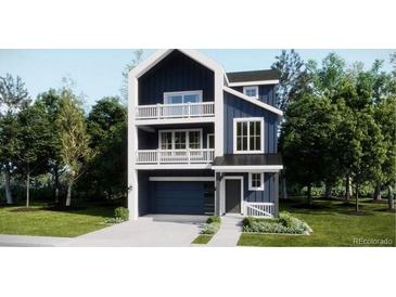 New construction with two-story home featuring balconies, a welcoming garage and stylish facade at 7185 Waterleaf Trl, Littleton, CO 80125