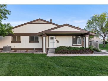Charming home with a well-maintained lawn, complemented by neat landscaping and a welcoming entrance at 8767 Chase Dr # 195, Arvada, CO 80003