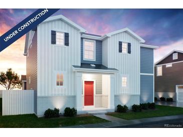 Two-story home with red door, white and gray siding, and landscaping at 22311 E 38Th Pl, Aurora, CO 80019