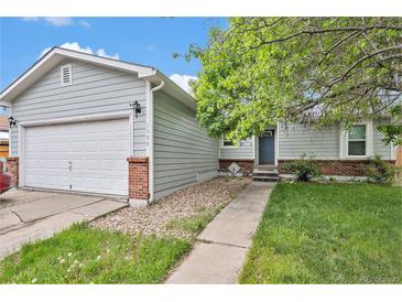 Charming single-Gathering home with two-car garage and a well-manicured lawn in a quiet neighborhood at 1390 W 78Th Cir, Denver, CO 80221