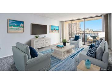 Bright living room featuring stylish furniture, a flat-screen TV, and a balcony with city views at 1020 15Th St # 7A, Denver, CO 80202