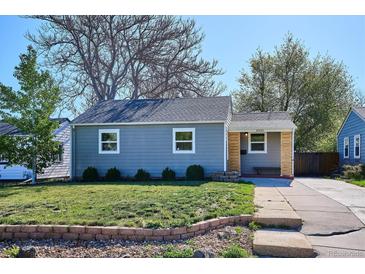 Charming home featuring a well-maintained lawn and a freshly painted exterior in a desirable neighborhood at 4920 Clay St, Denver, CO 80221