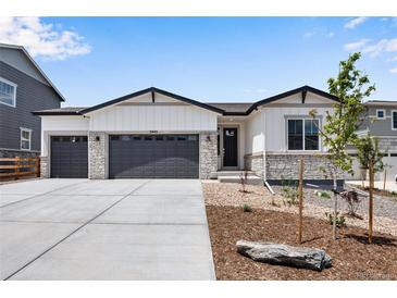 Charming single-Gathering home boasting a three-car garage, stylish accents, and well-maintained landscaping at 3443 N Gold Bug Ct, Aurora, CO 80019