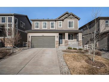 Charming two-story home featuring a two-car garage and stone accents at 3378 Shoveler Trl, Castle Rock, CO 80104