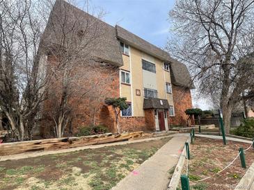Multi-level apartment building featuring unique stone and siding, and a well-maintained walkway at 707 W 96Th Ave # 9, Thornton, CO 80260